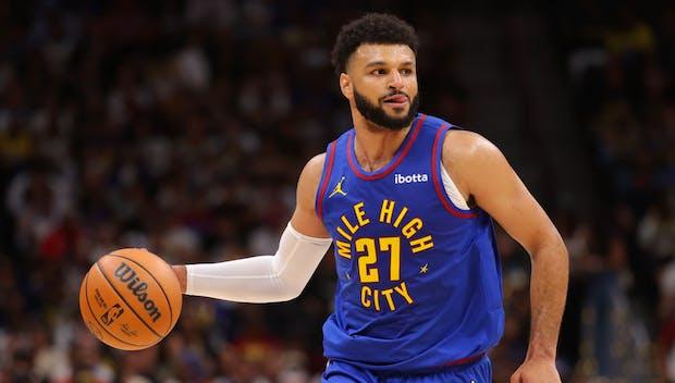 DENVER, COLORADO - OCTOBER 24: Jamal Murray #27 of the Denver Nuggets looks to pass against the Los Angeles Lakers in the second half of the NBA Opening night game at Ball Arena on October 24, 2023 in Denver, Colorado. NOTE TO USER: User expressly acknowledges and agrees that, by downloading and/or using this Photograph, user is consenting to the terms and conditions of the Getty Images License Agreement. (Photo by