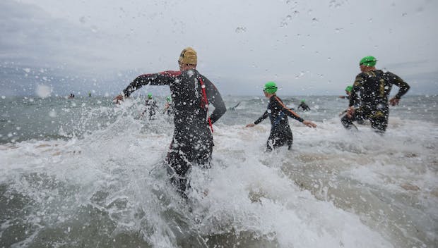 Participants compete at the Ironman 70.3 event in Sardinia in Italy. (Photo by